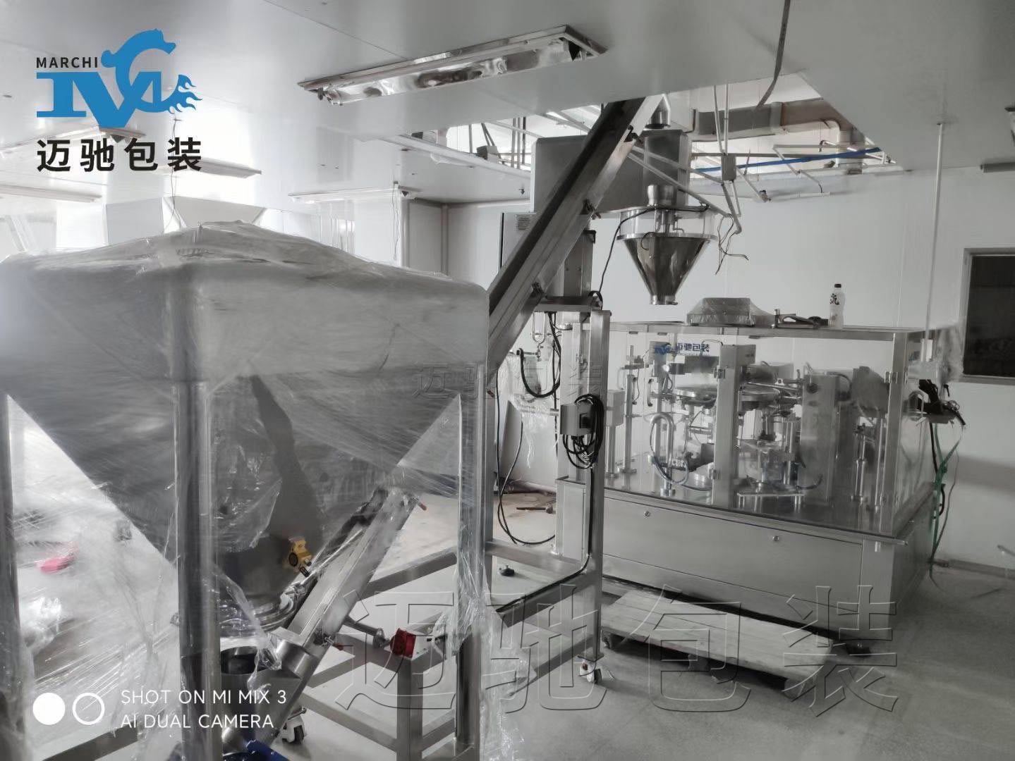 豆奶粉小袋包装全面自动化——给袋式包装机实现从打码到码垛